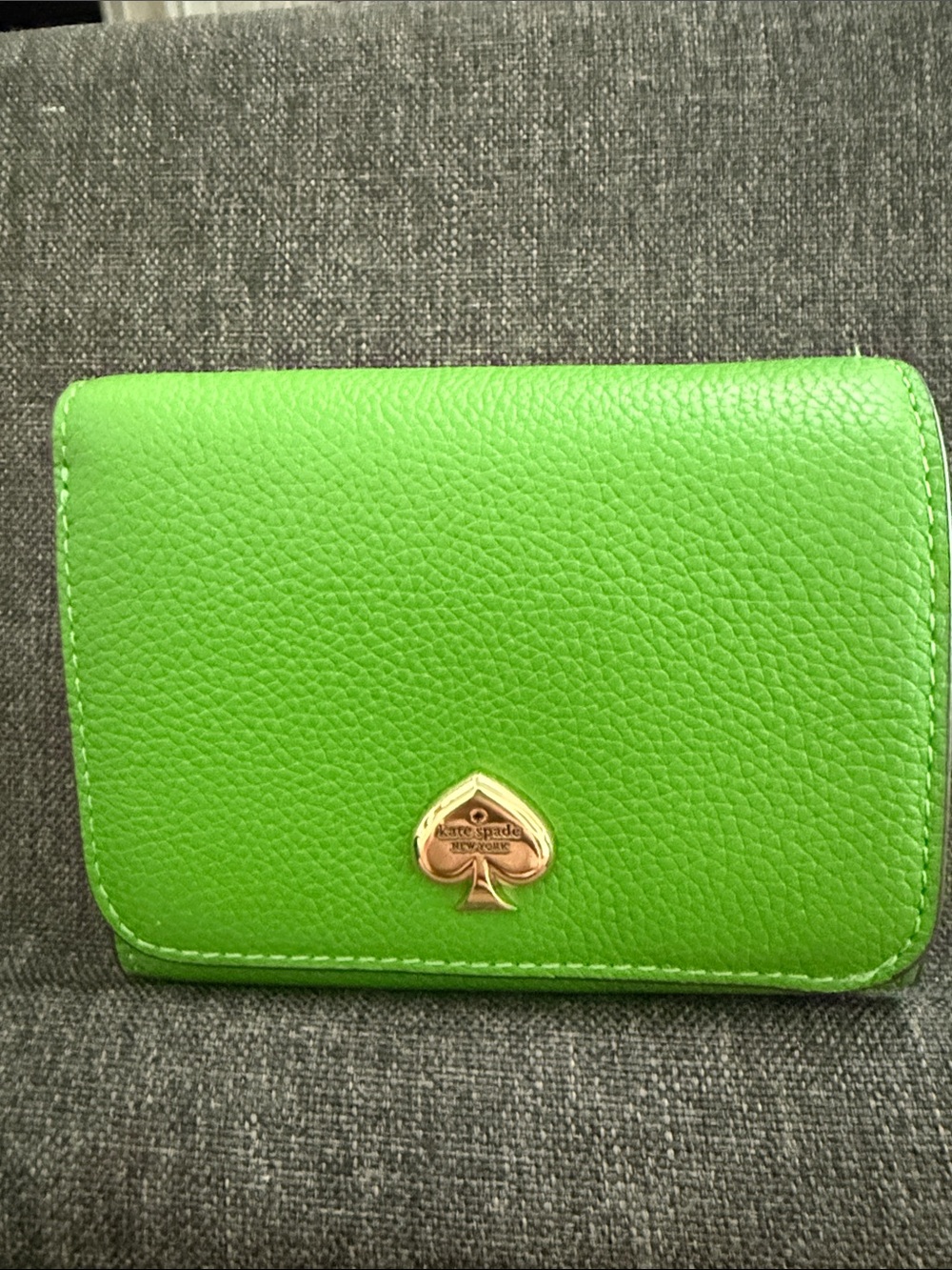 kate spade Bright Green Pebbled Leather wallet with Gold Spade Emblem